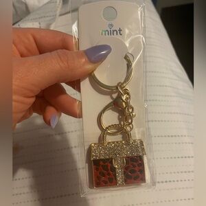 Black and red purse bag charm